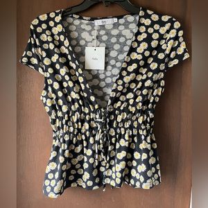 NWT ADIKA black top with daisy detail